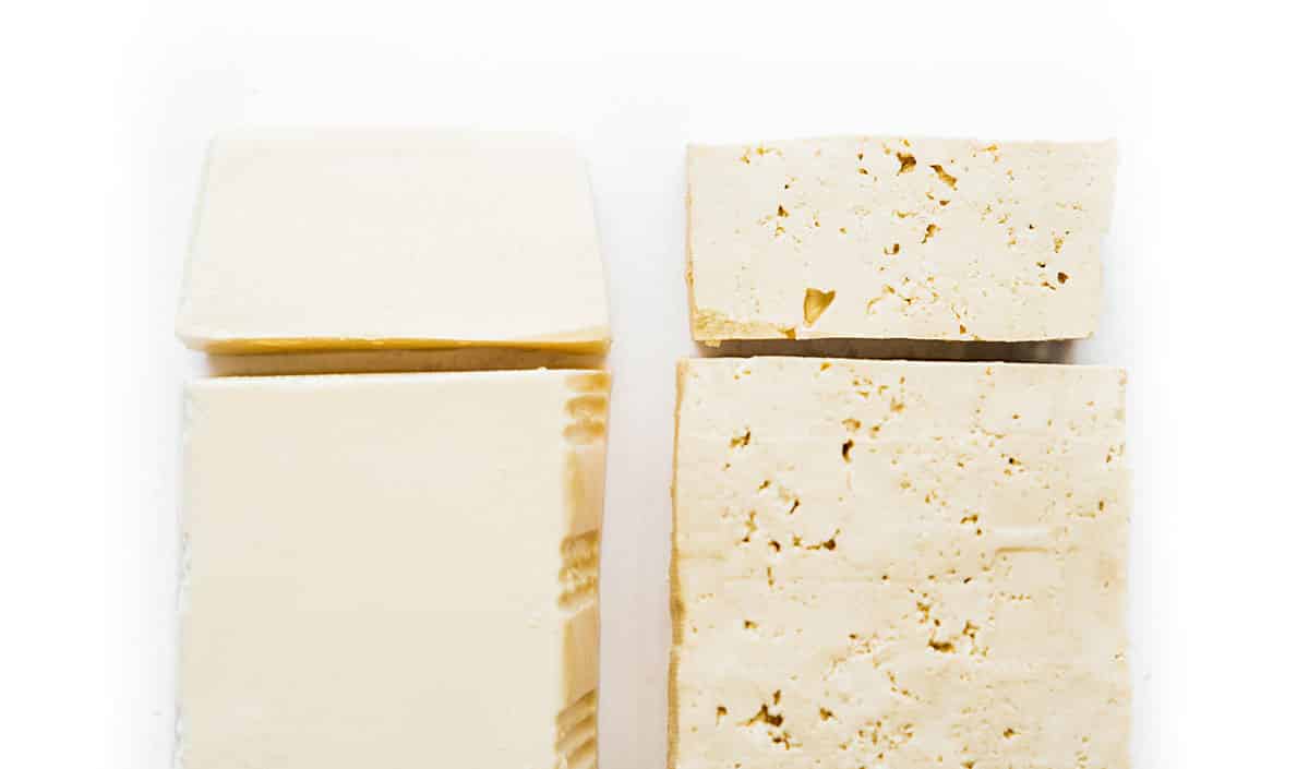 Two types of tofu on a white background