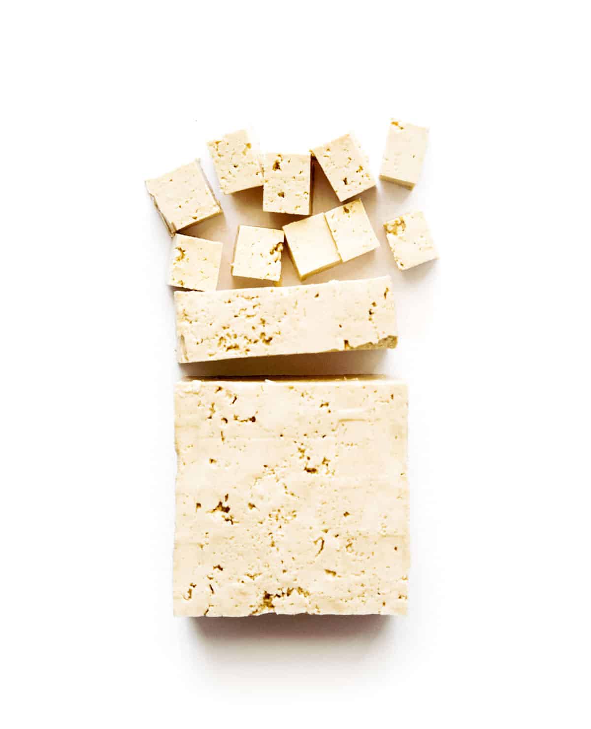 Photo of cubed tofu on a white background