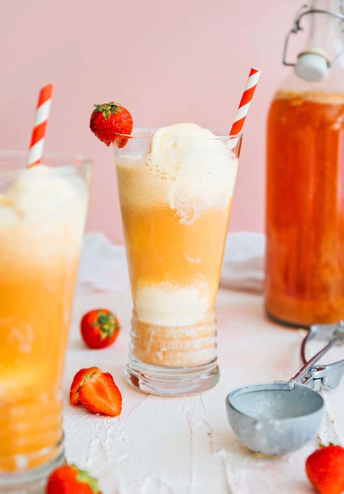 Kombucha float in a glass with a straw