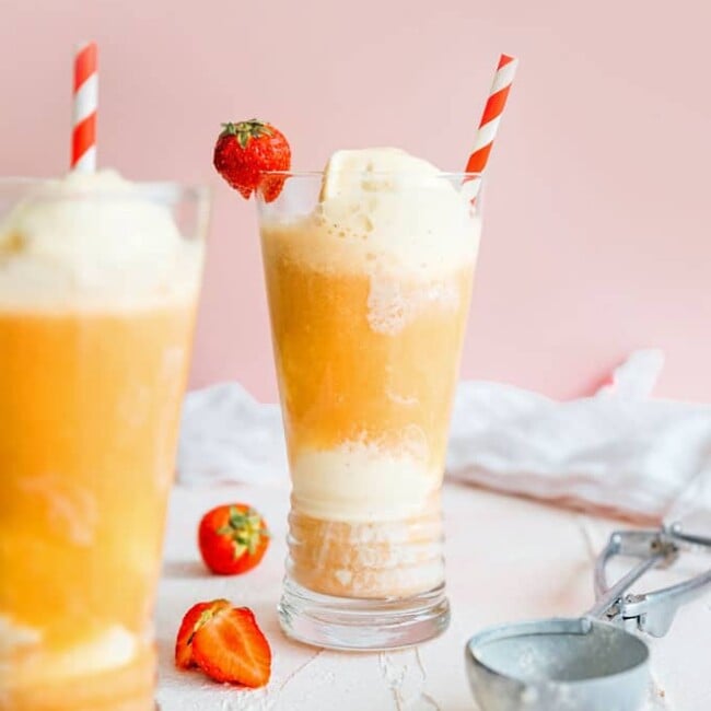 Kombucha ice cream float in a glass with a straw