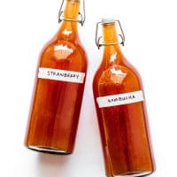Strawberry kombucha in fermentation bottles