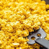 Close-up photo of yellow tofu scramble vegan eggs