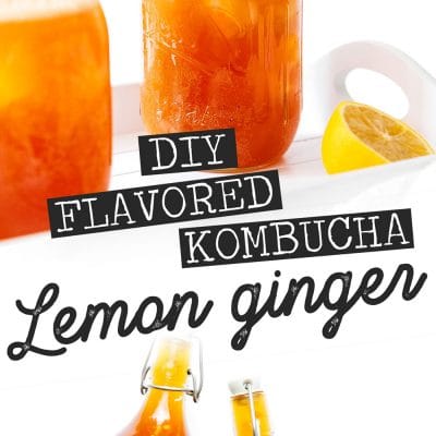 Lemon ginger kombucha in a mason jar on a white background