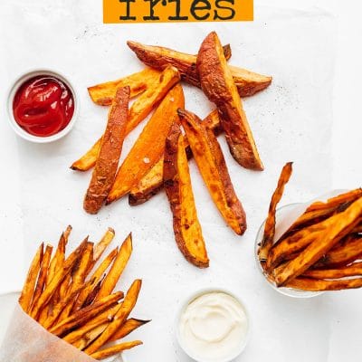 Air fryer sweet potato fries on a white background