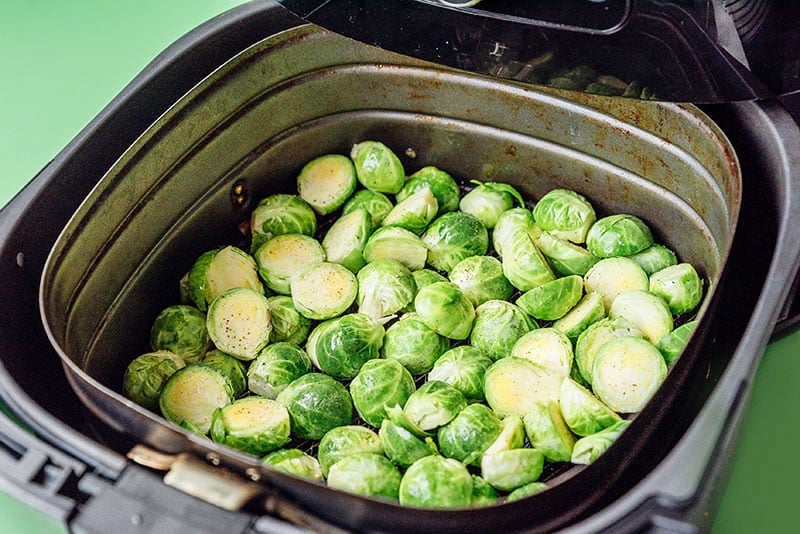 Raw Brussels sprouts in air fryer
