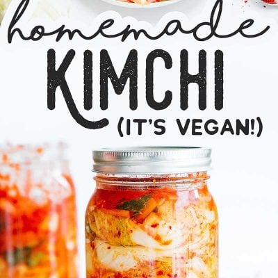 Homemade kimchi in a mason clash with white background