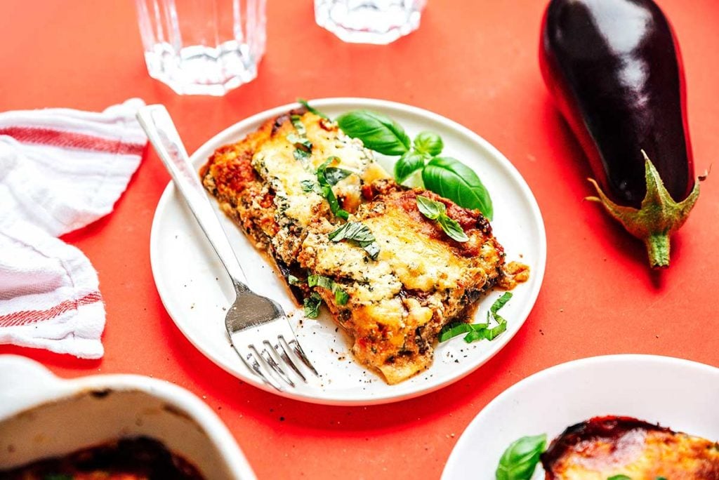 A plate filled with two servings of eggplant lasagna 