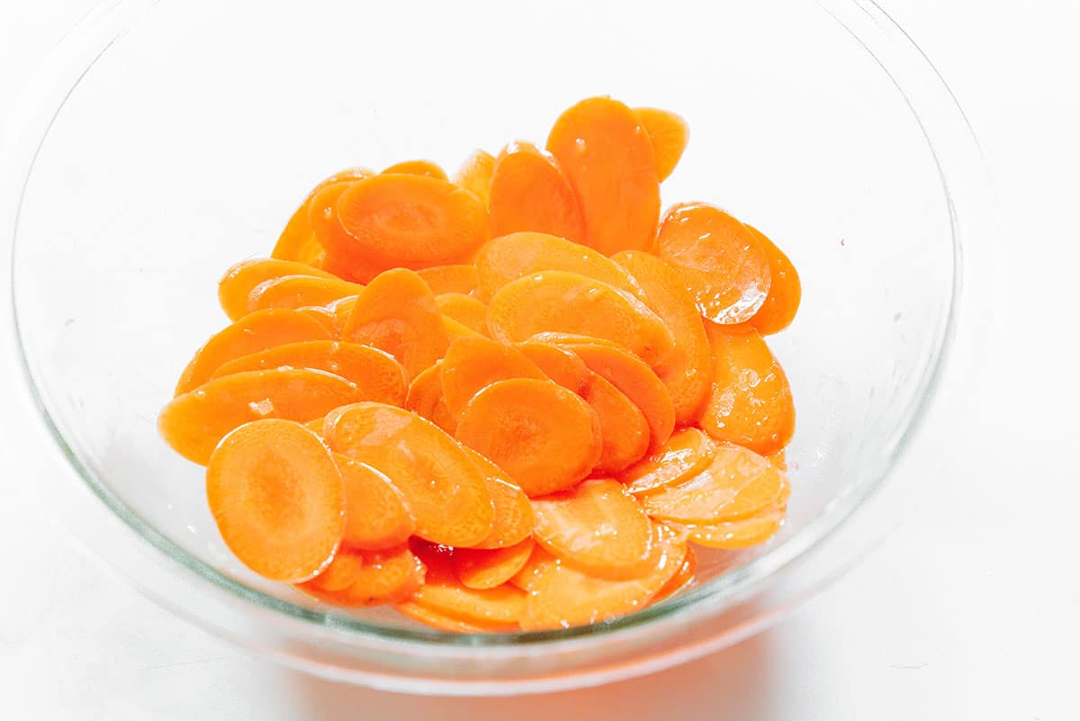 Sliced carrots in a a bowl.
