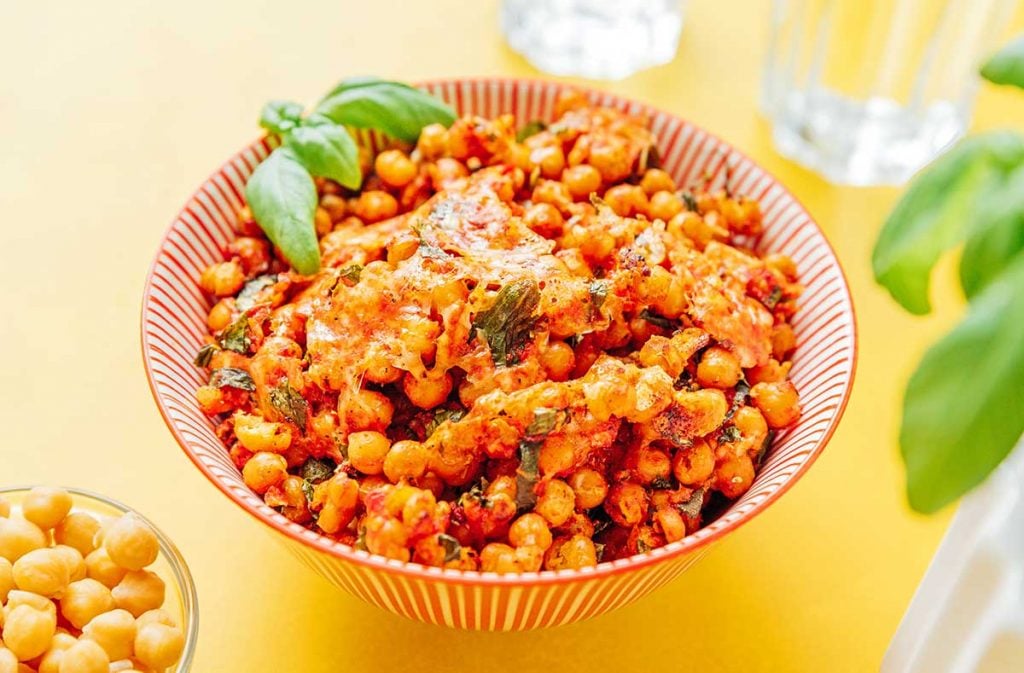 A bowl filled with pizza roasted chickpeas