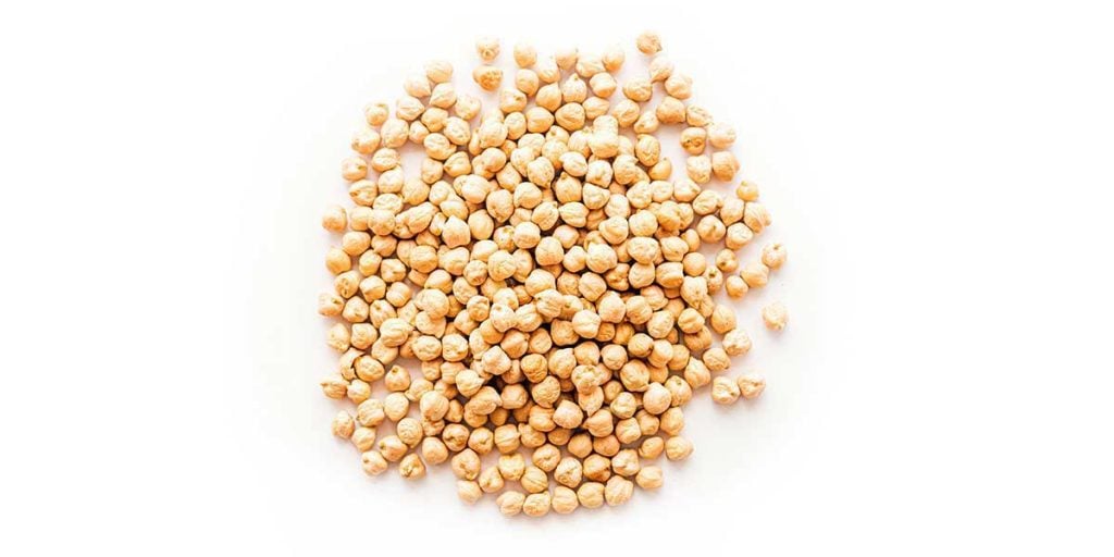Dried chickpeas on a white background