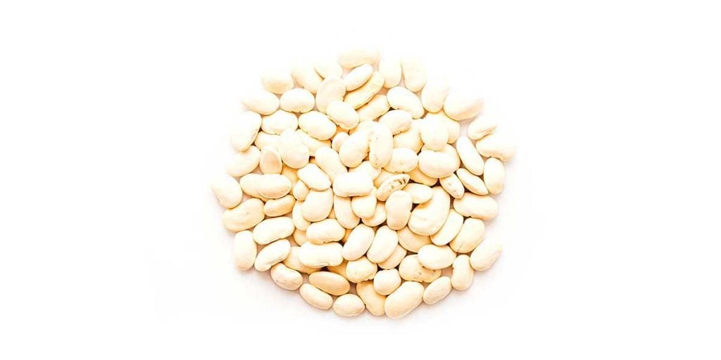 Dried haricot beans on a white background