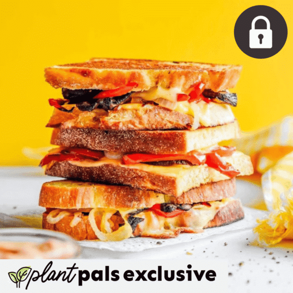 A stack of grilled cheese sandwiches with melted cheese and vegetables sits on a white surface, set against a bright yellow background. Plant pals exclusive text, a lock icon, and hints of curried melon salad inspiration are shown.