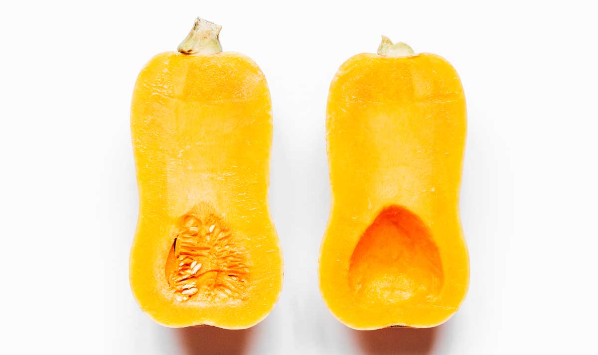 Two halves of a butternut squash facing up