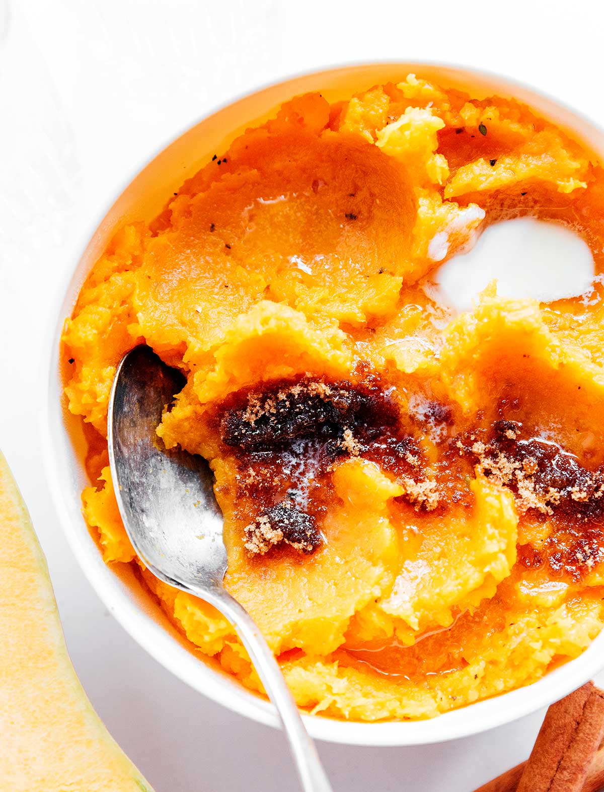 A bowl filled with sweet mashed butternut squash