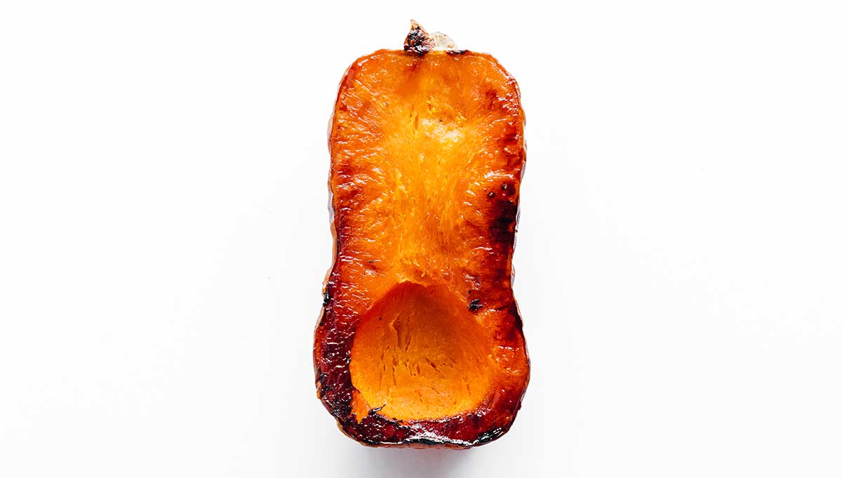 One roasted half of a butternut squash