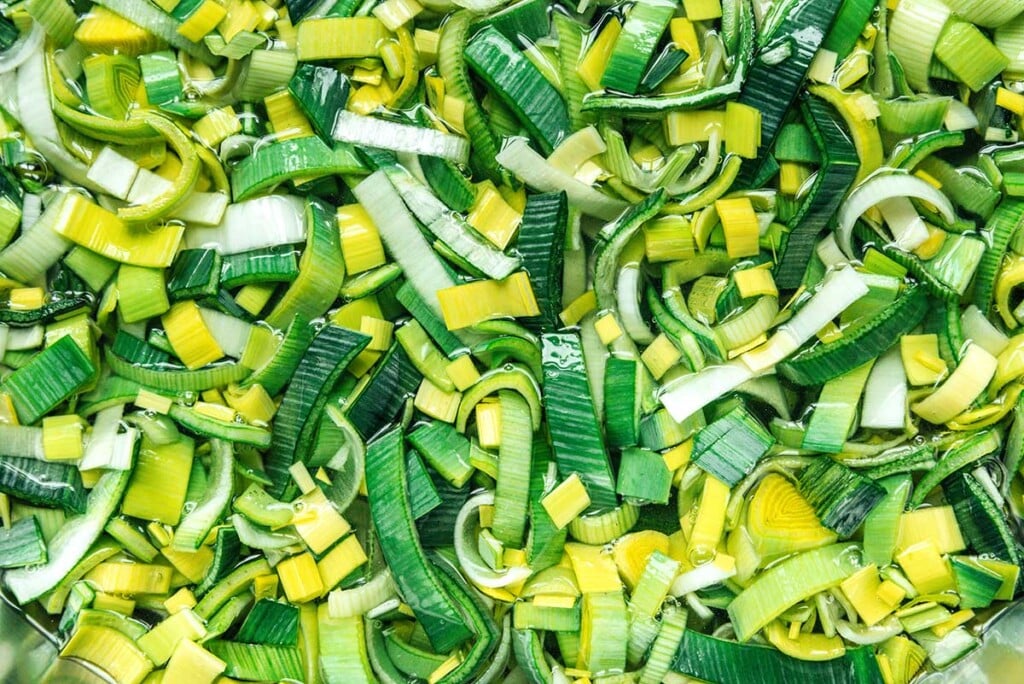 A up-close image detailing the texture of sliced leek pieces