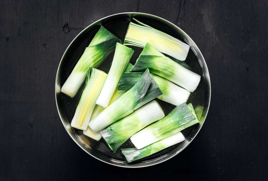 A bowl of prepped leeks