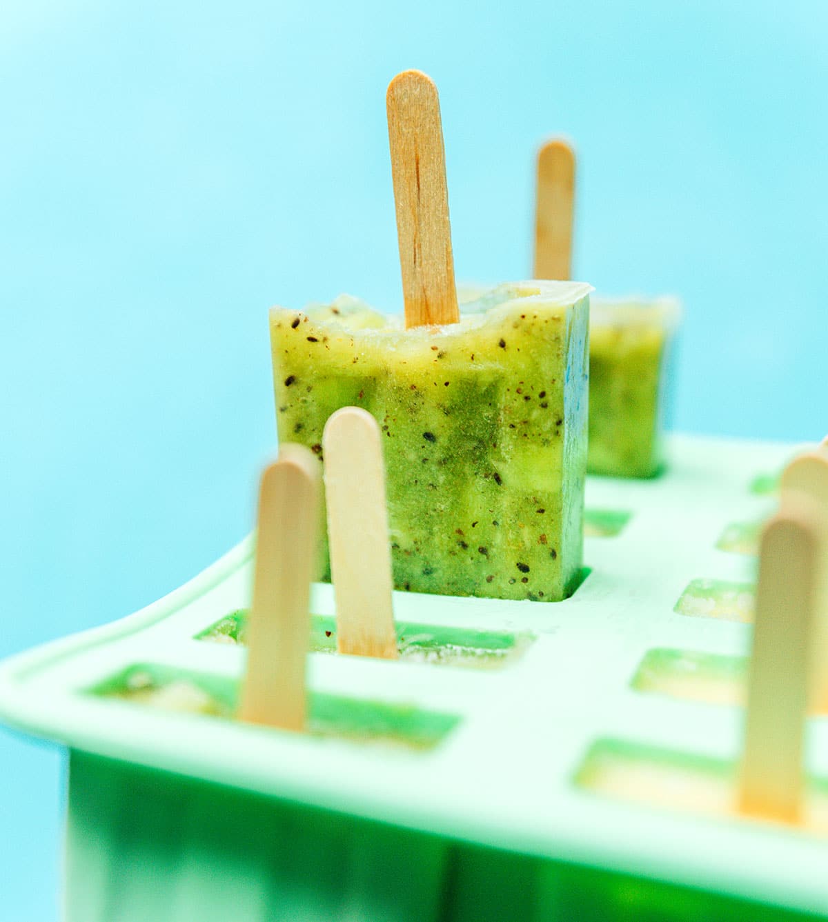 Kiwi popsicle in a popsicle mold