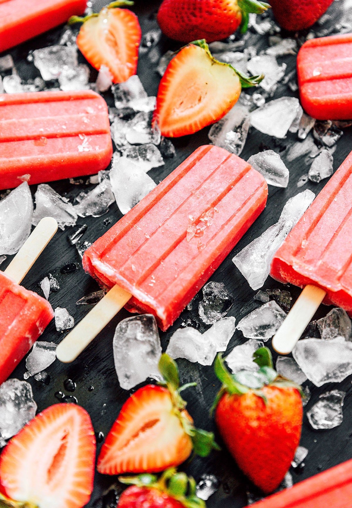 A close-up shot detailing the texture of sugar-free strawberry popsicles