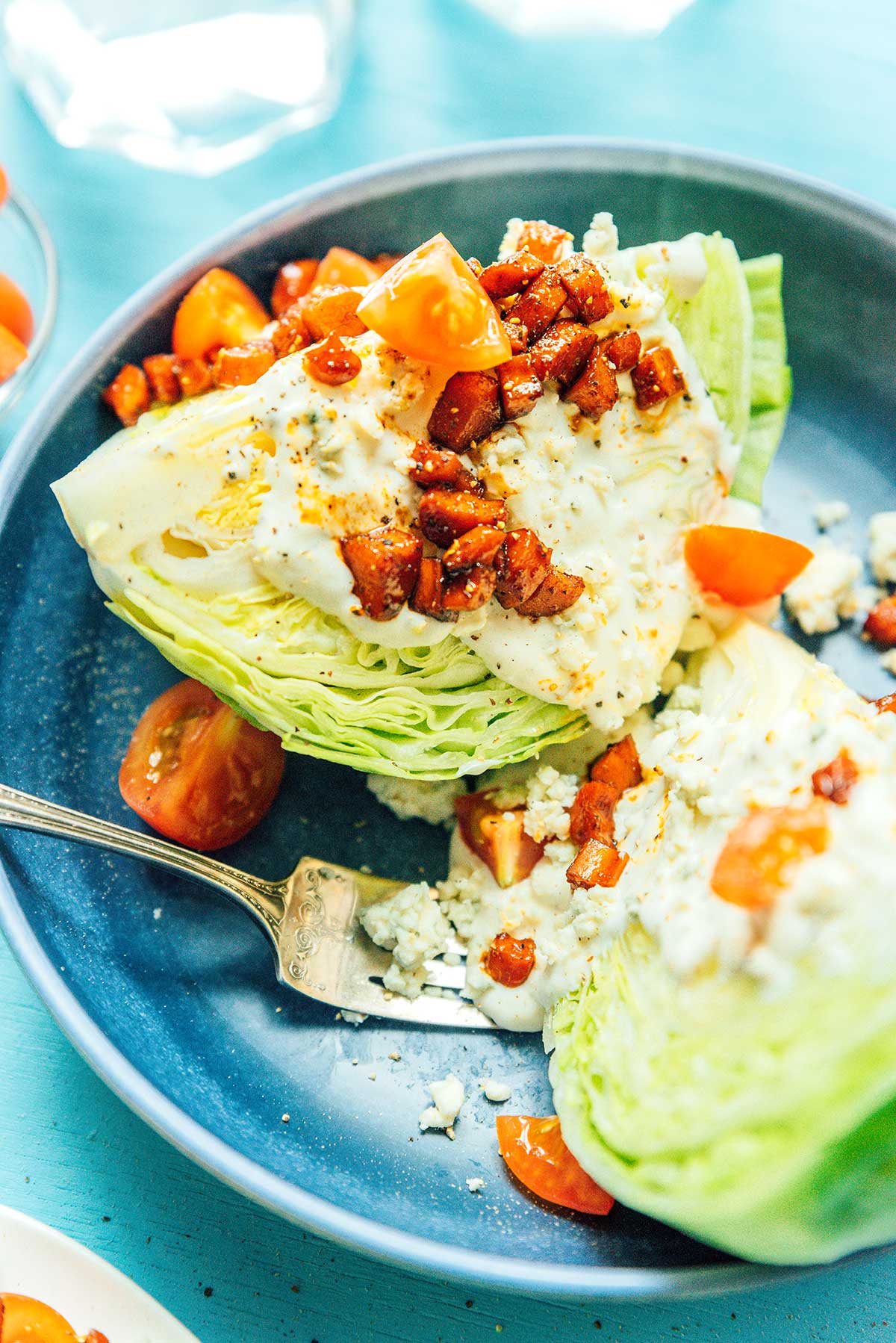 A close-up view detailing the texture and ingredients in vegetarian wedge salad
