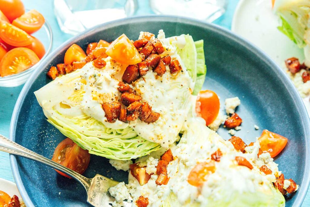 A close-up view detailing the texture and ingredients in vegetarian wedge salad