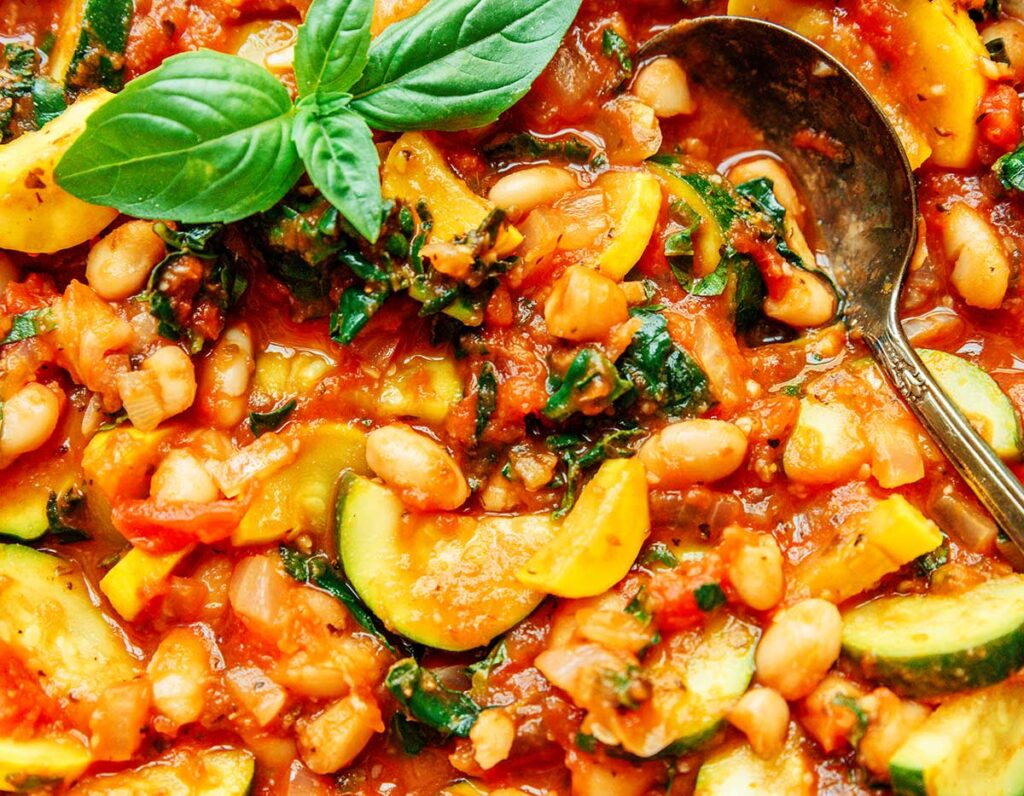 A close up view detailing the texture of zucchini stew