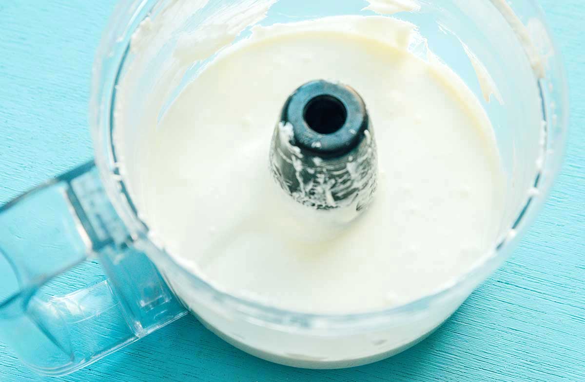 An image of whipped feta in a food processor.