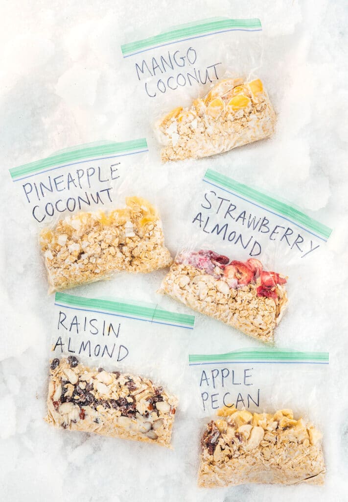 5 bags of portable oatmeal filled with various flavor combinations including mango coconut, pineapple coconut, strawberry almond, raisin almond, and apple pecan