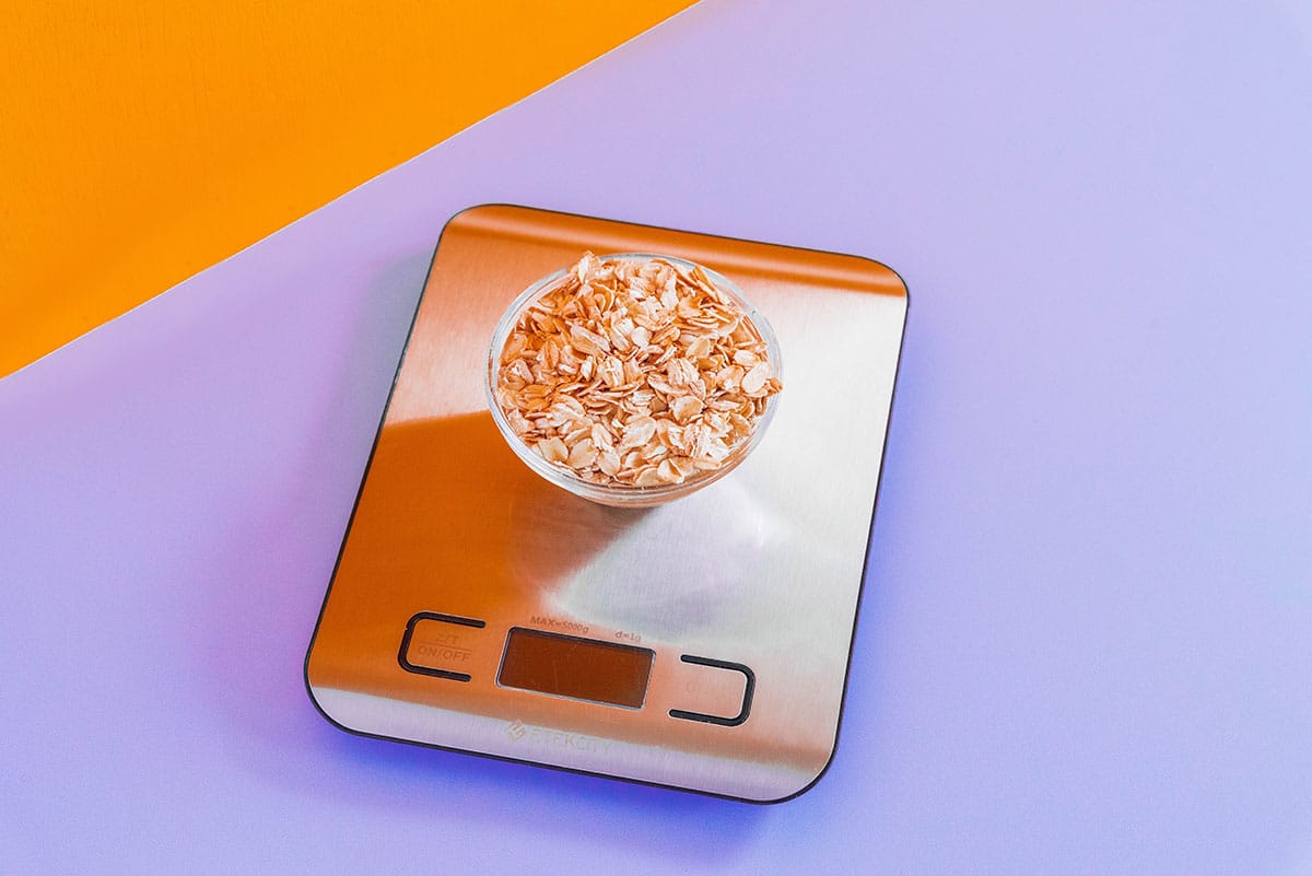 A scale with a bowl of oats on it