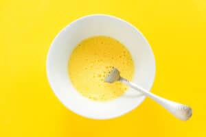 Eggs mixed in a bowl.