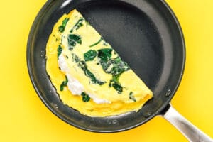 Cottage cheese omelette in a pan.