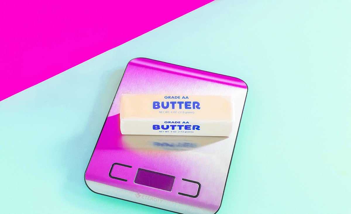 Colorful scale with butter on it
