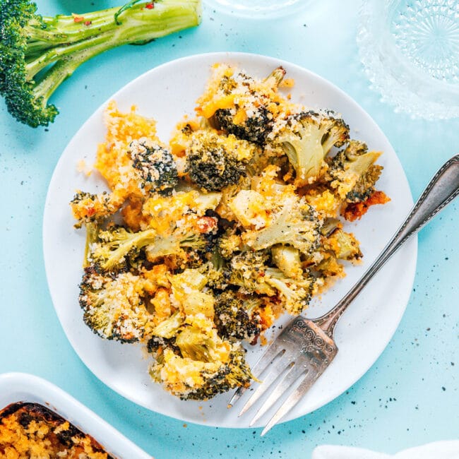 Broccoli casserole on a white plate.