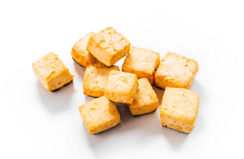 Fajita flavored tofu cubes that have been baked.