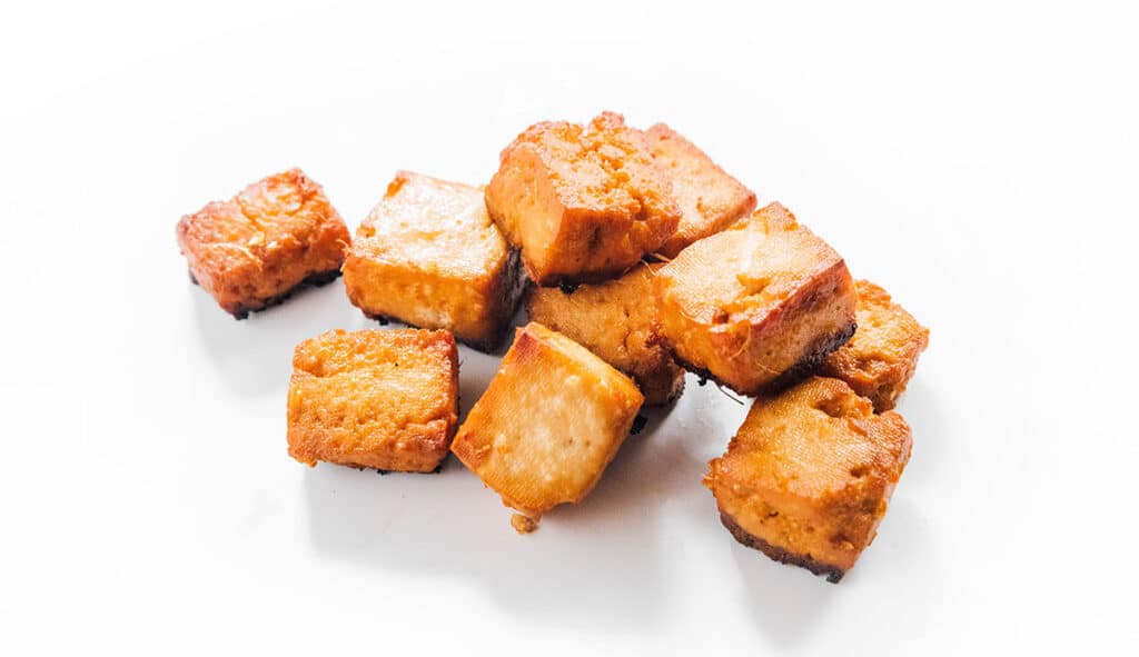 Sesame ginger marinade baked into tofu cubes.