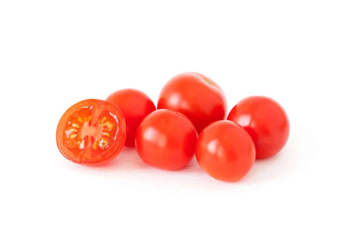 Cherry tomatoes on a white background.