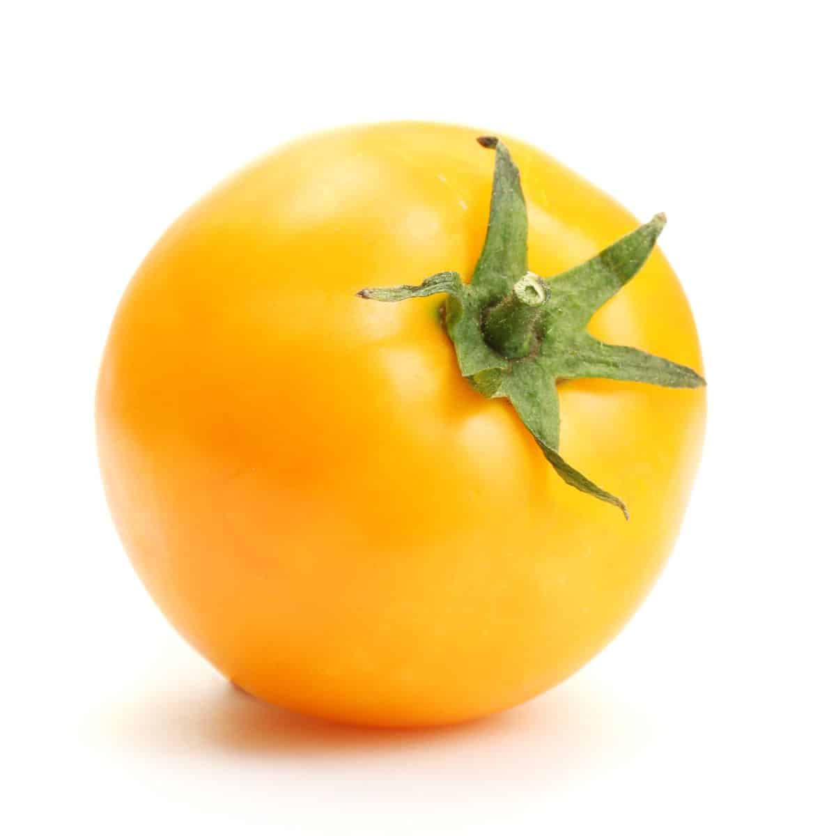 Jubilee tomato on a white background.