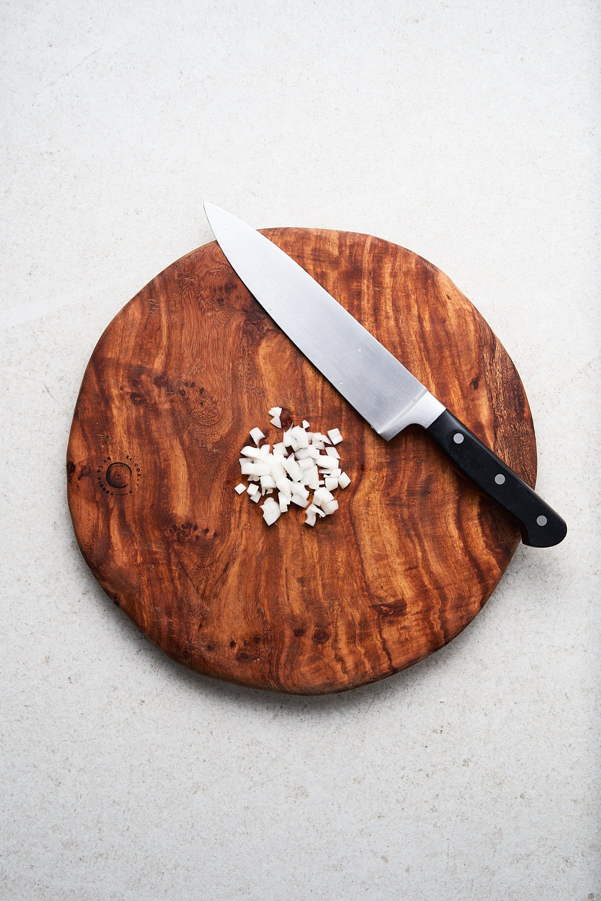 Diced spring onion on a cutting block