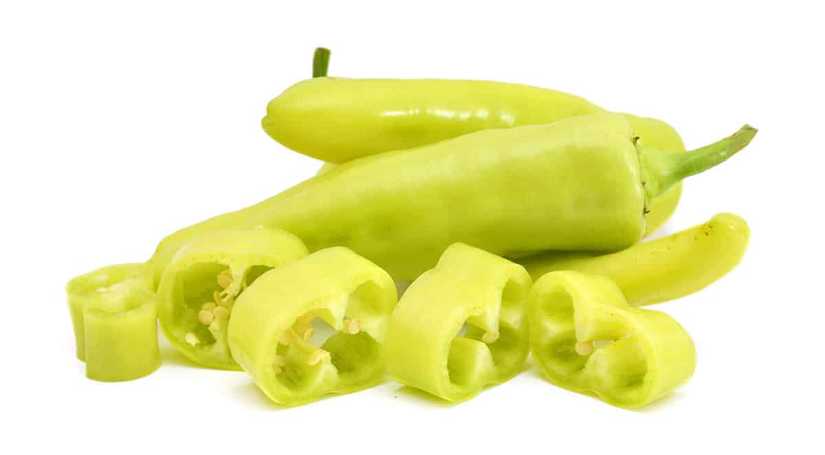 Banana peppers on white isolated background.