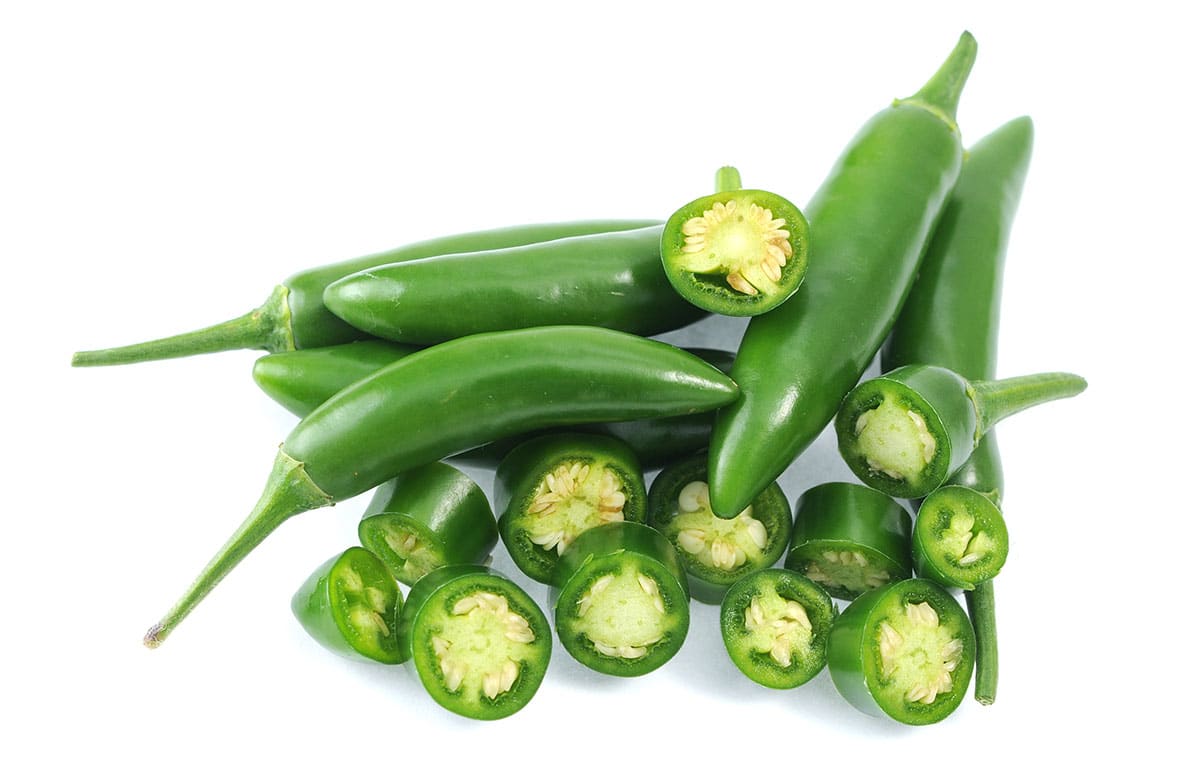 Serrano peppers on white isolated background.