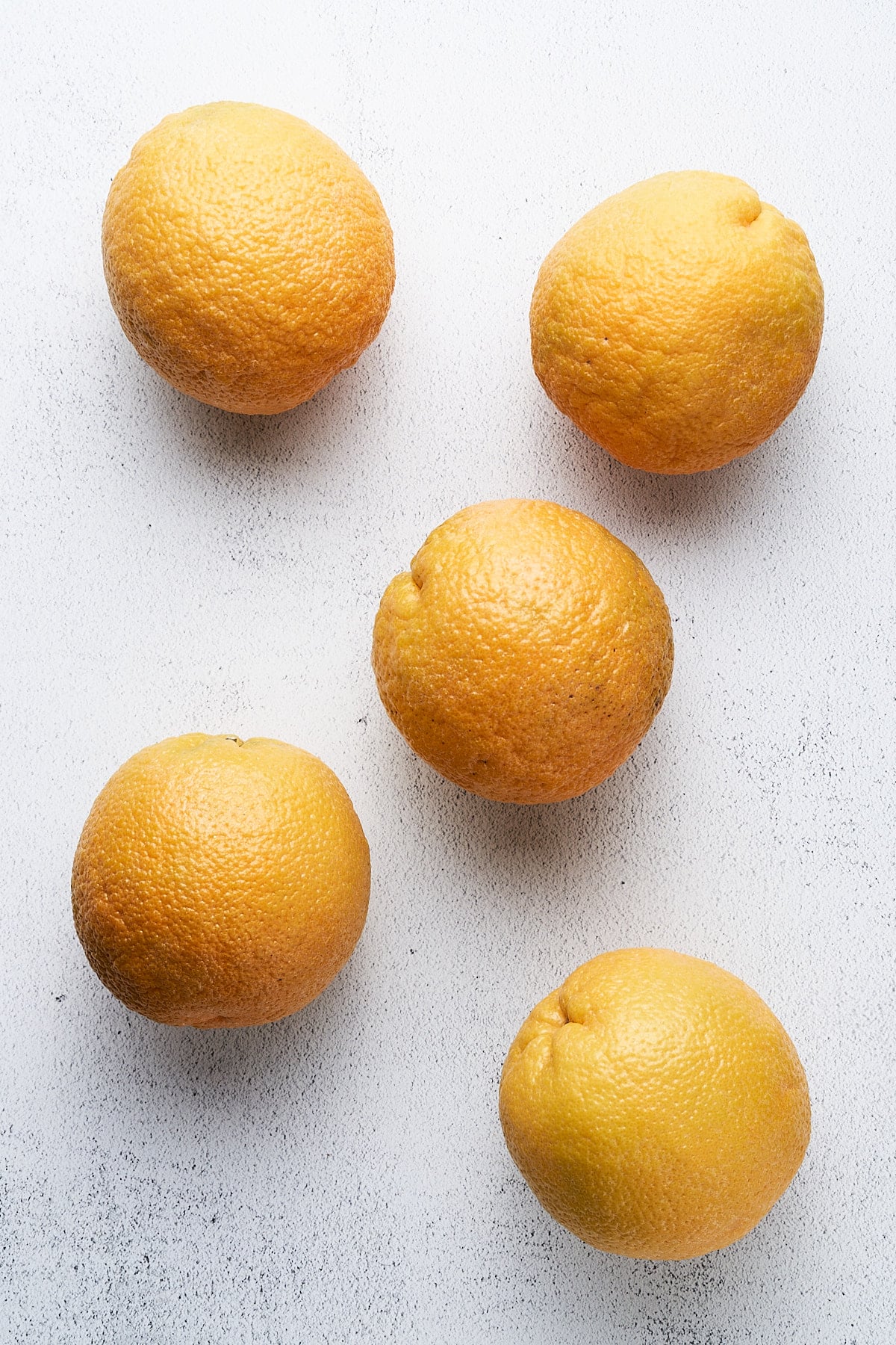 Oranges on a table.
