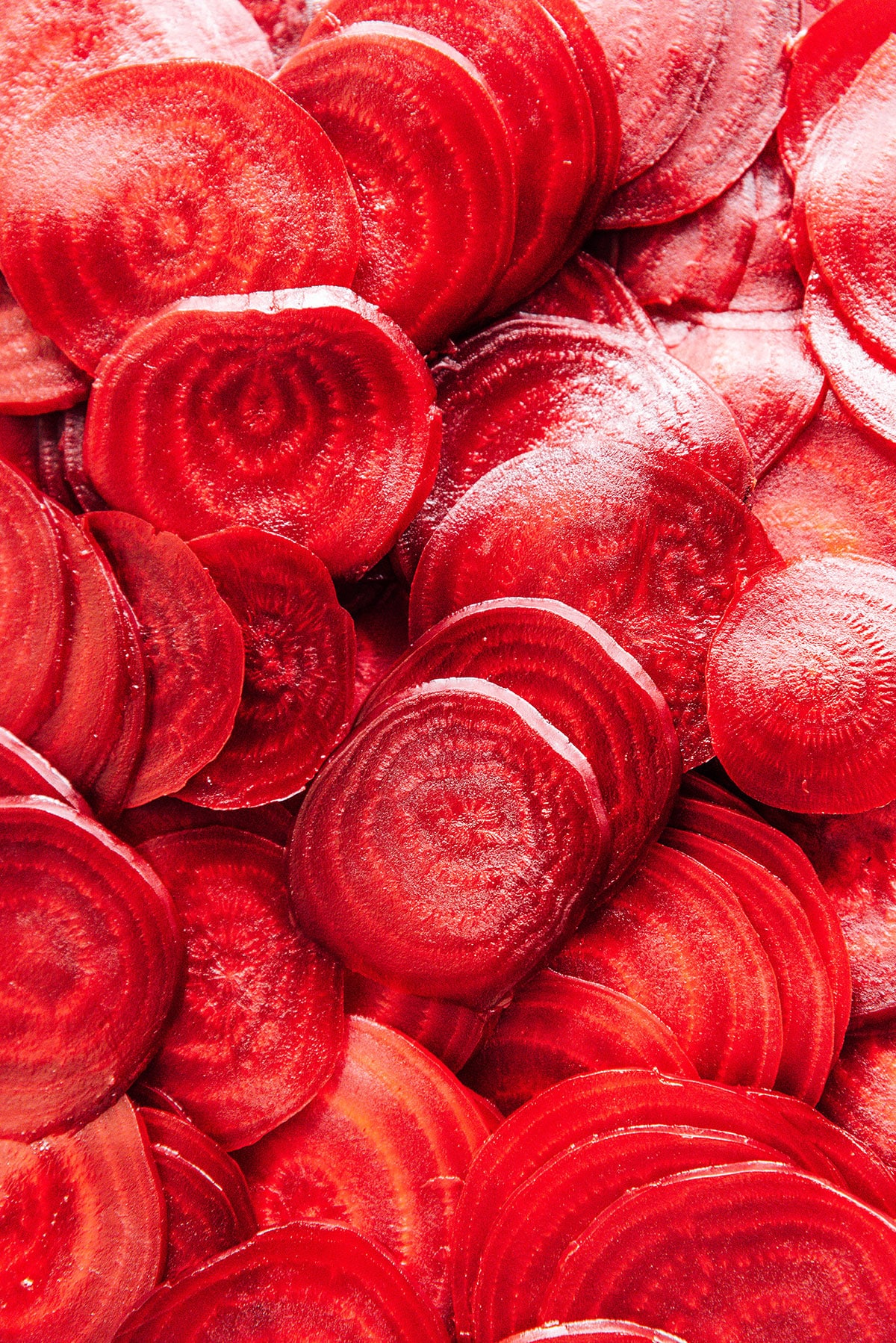 Sliced beets that are bright red.