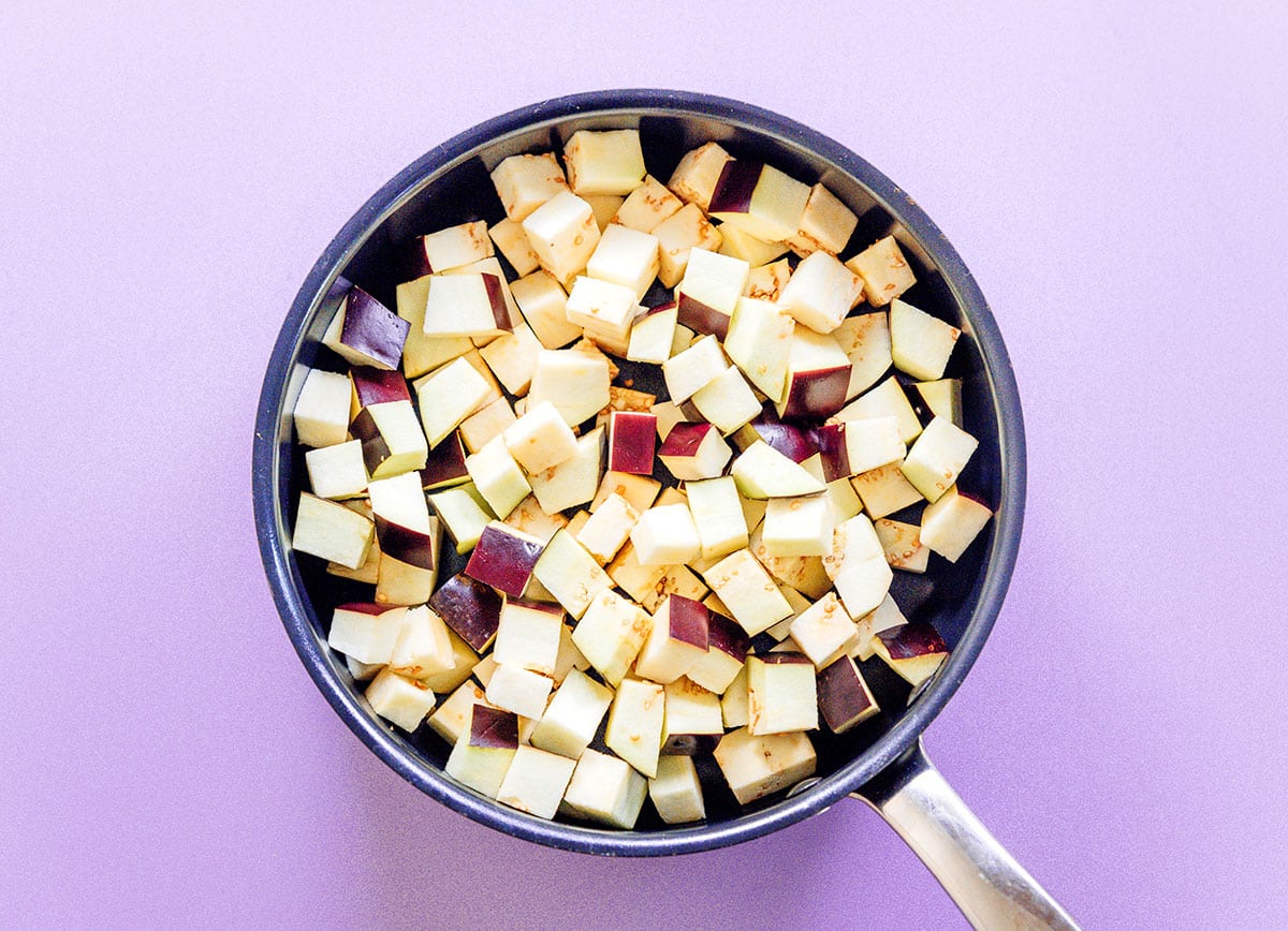 Diced eggplant before cooking in a saute pan.