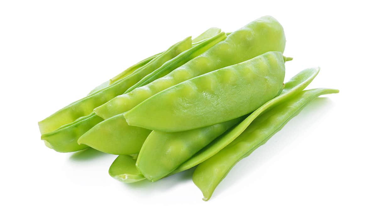 Snow peas isolated on a white background.