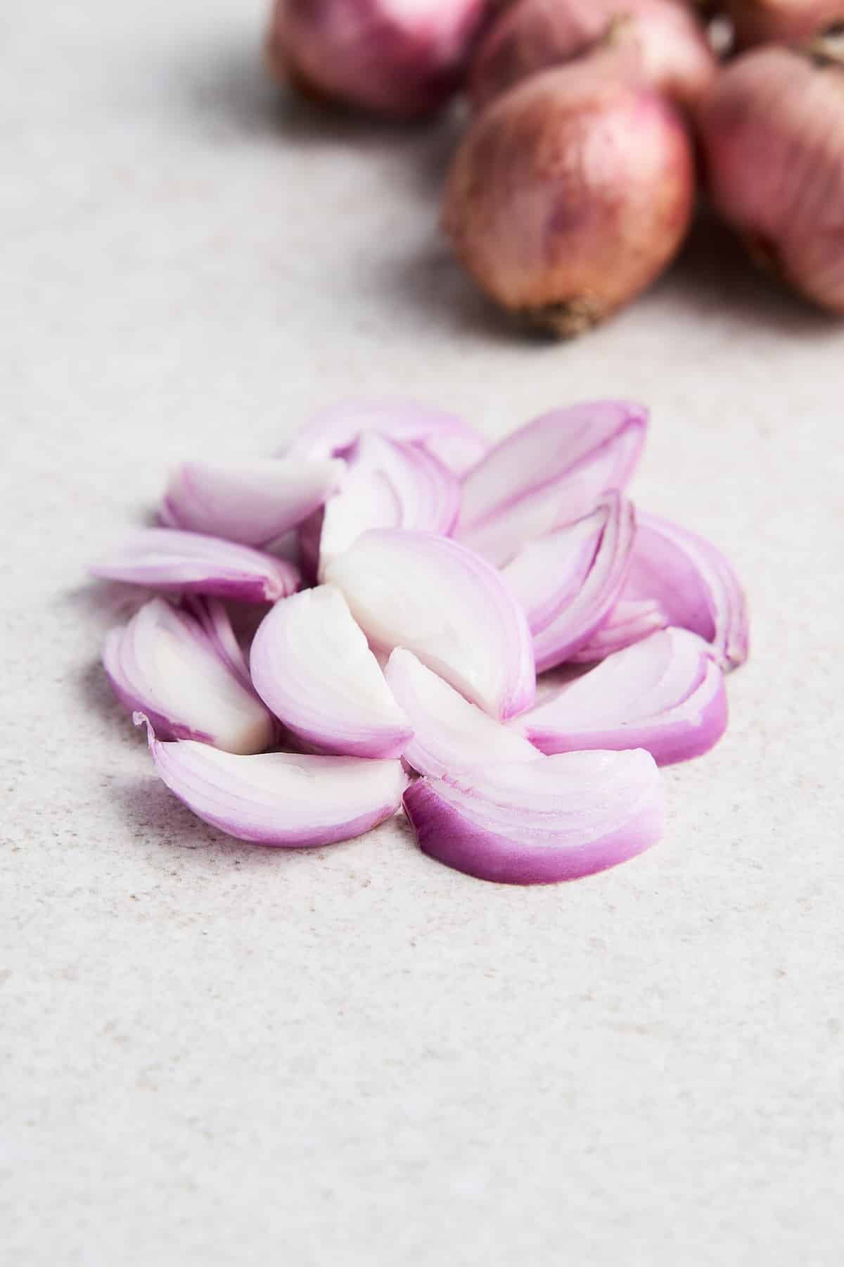 Thickly sliced shallots.