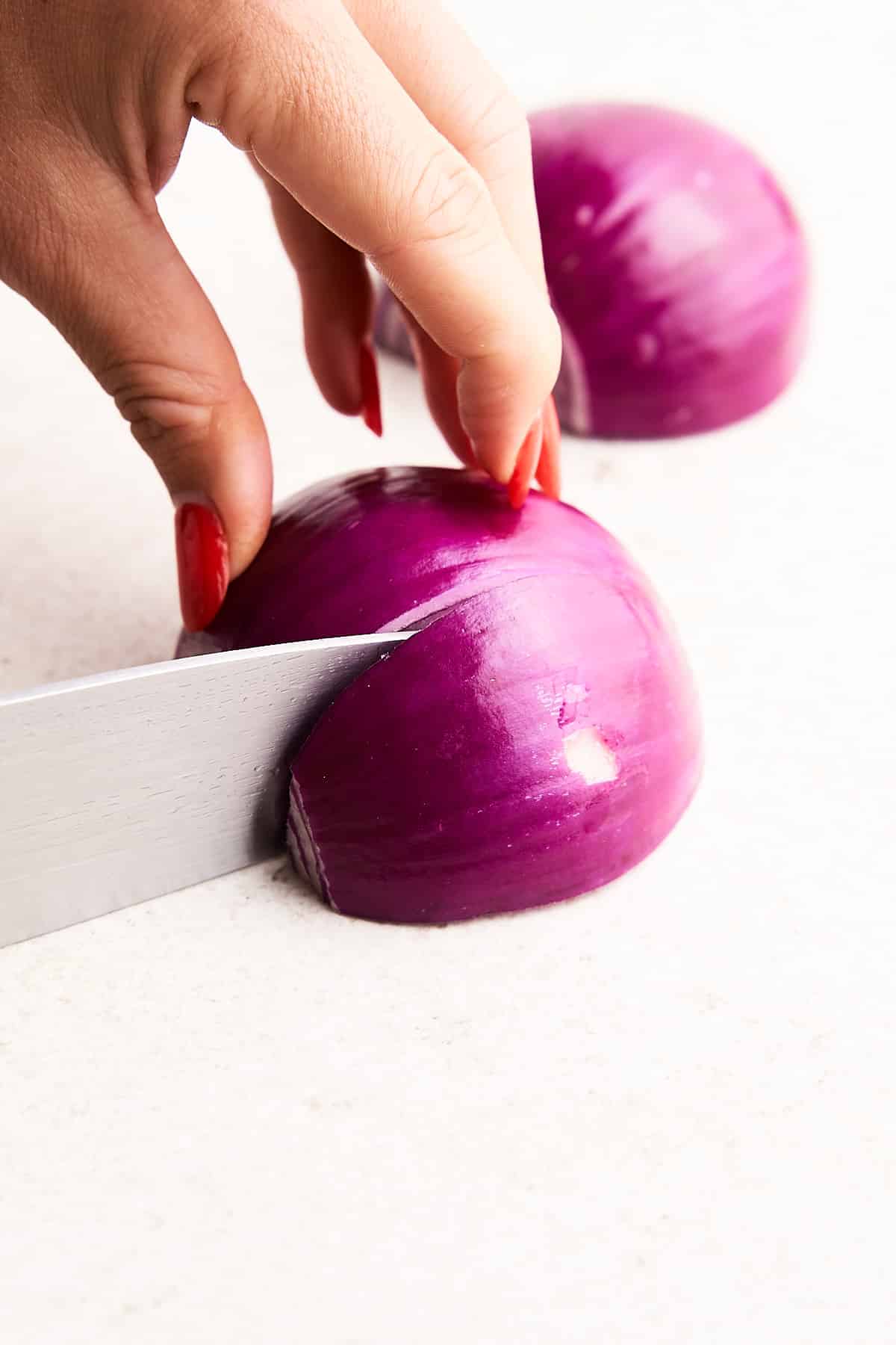 Chopping an onion.