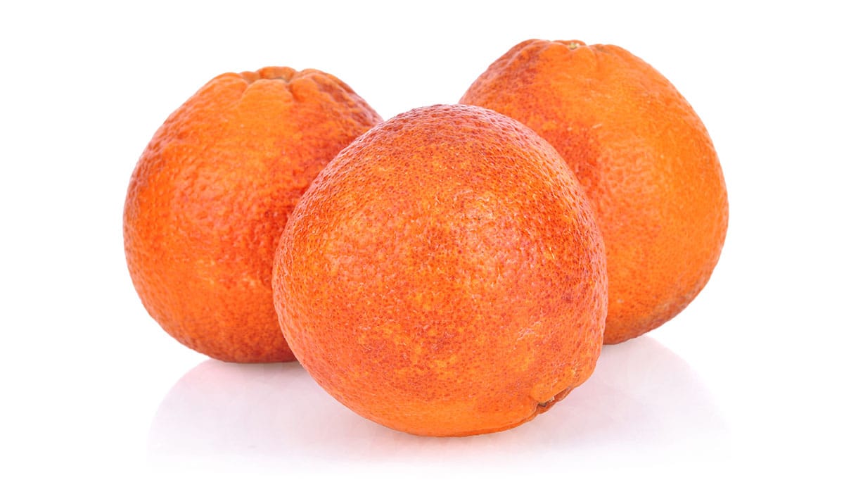 Moro oranges on a white background