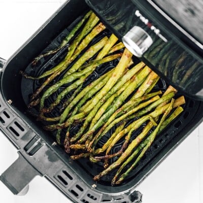 Frozen asparagus in an air fryer.