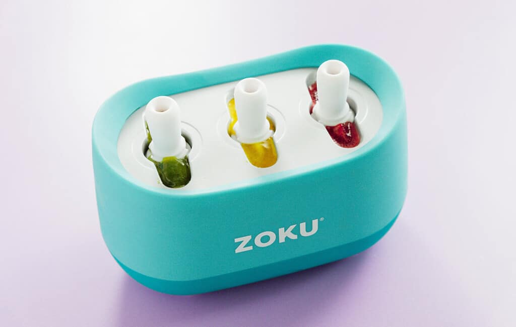 Zoku popsicle mold with fruit juices.