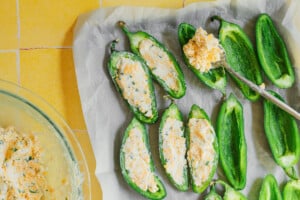 Stuffing jalapenos.